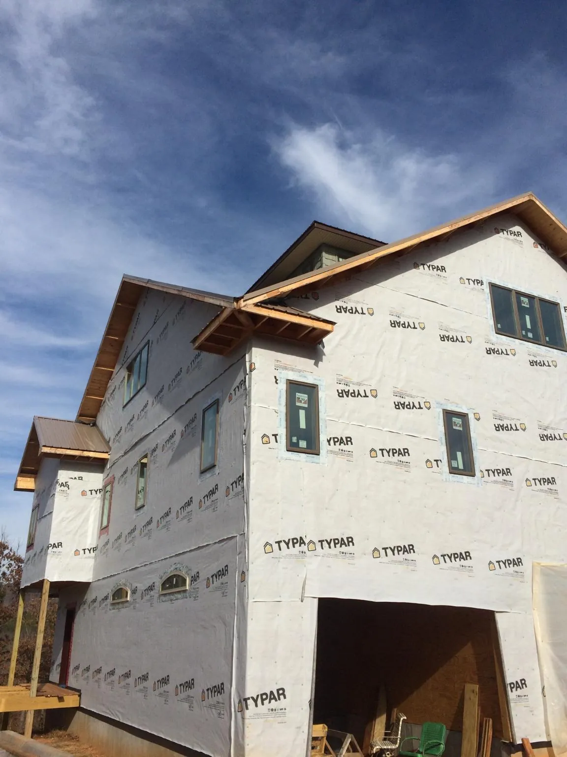 Stick built house wrapped in Typar with new roof framing and dormers in Farmersburg